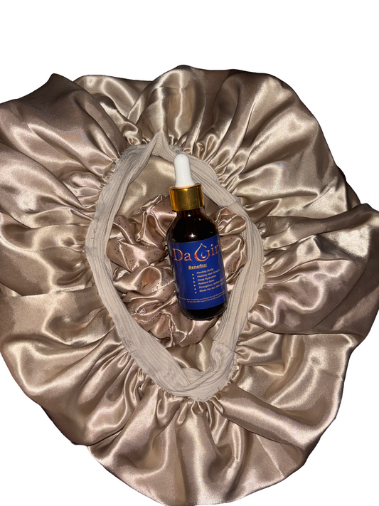 Silk pillowcase with a bottle of serum on a white background